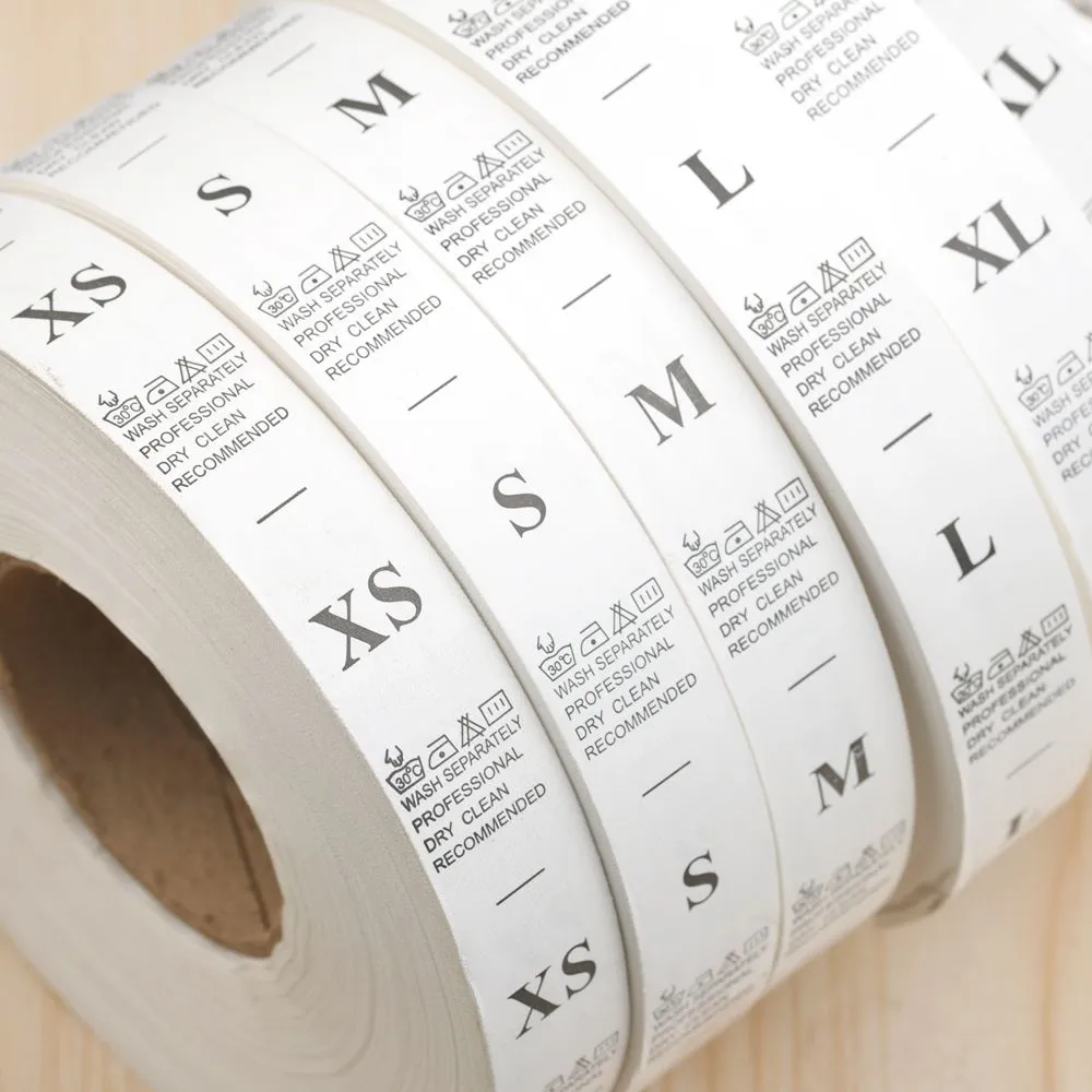 Nh&atilde;n vải NT003 đ&atilde; in care label v&agrave; nh&atilde;n size